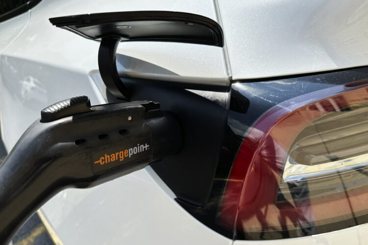 Governor pledges to fund dozens of projects to expand EV charging